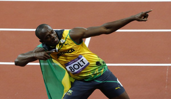 Jamaica's Usain Bolt celebrates after winning the men's 100m final during the London 2012 Olympic Games at the Olympic Stadium