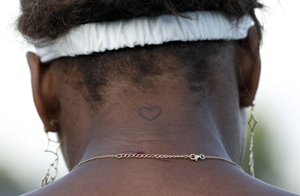 A heart design is seen on the back of Serena Williams of the U.S. during her ladies doubles match with her sister, Venus Williams of the U.S, against Julie Ditty of the U.S. and Renata Voracova of the Czech Republic at the 2010 Wimbledon tennis championshi