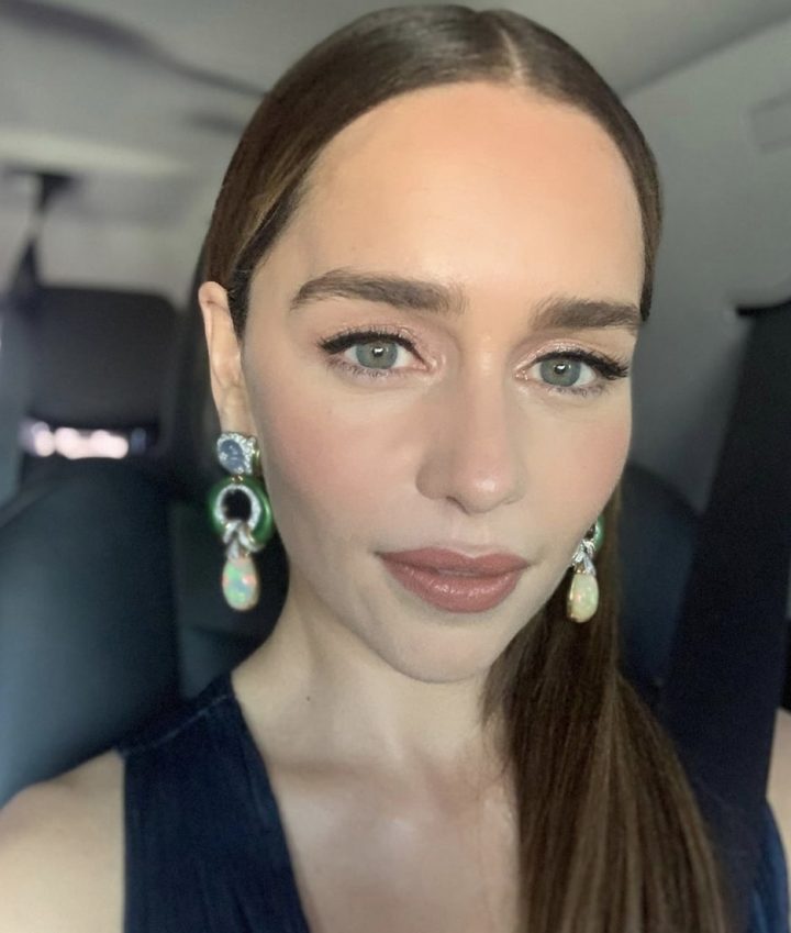 Emilia Clarke regards stars