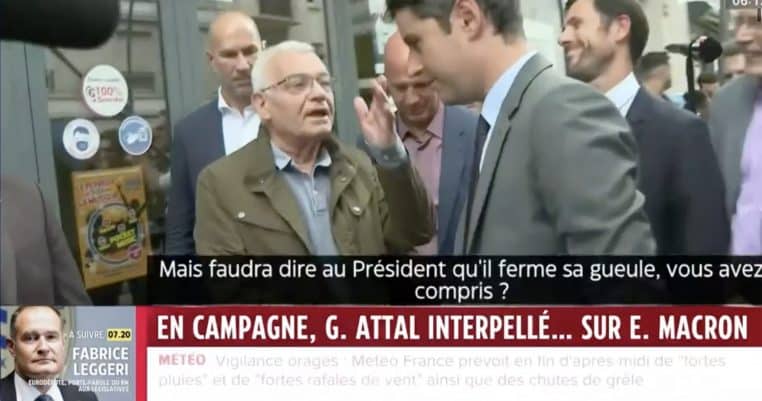 Image capture d'écran un passant insulte le président Macron devant Gabriel Attal