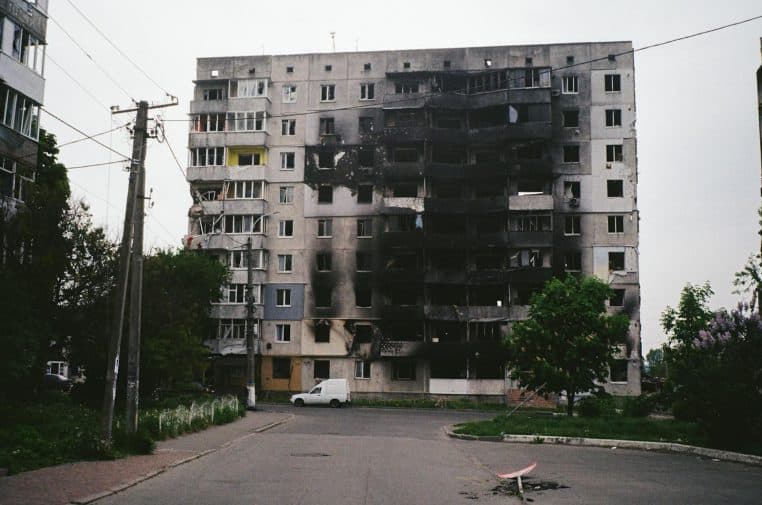 A heavily damaged apartment building in Borodyanka, Ukraine, illustrating urban devastation.